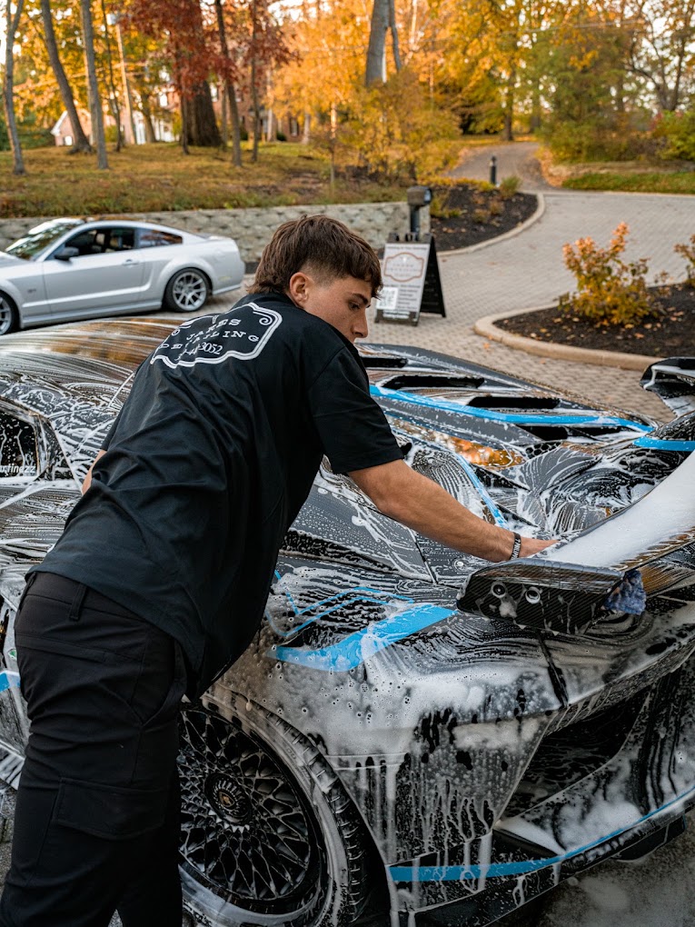 Elevare Lux Detailing maintaining a vehicle at a client's home